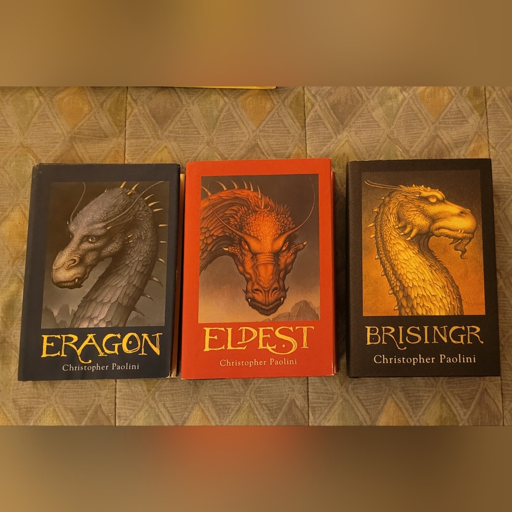 (3)  Eragon series Hard Back books. Christopher Paolini